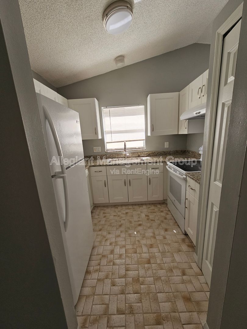 AVAILABLE NOW! 2/2 Single Famly Home W/Converted Garage by Valencia in East Orlando property image