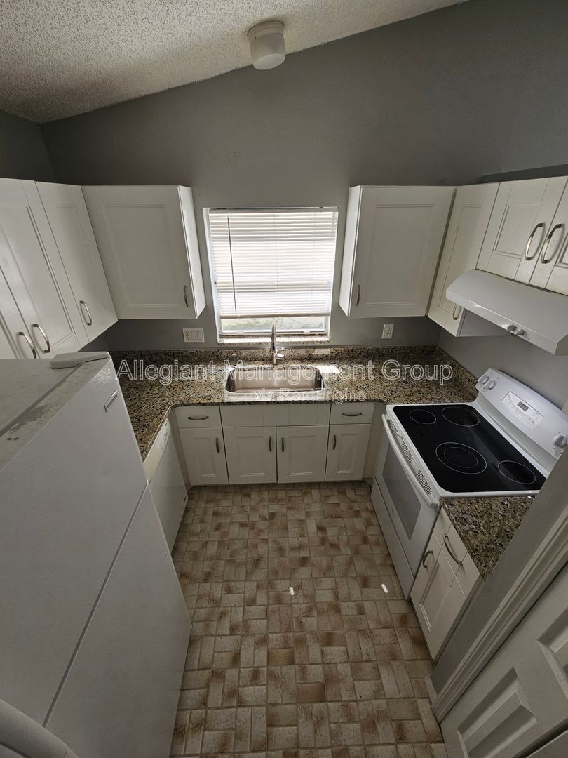 AVAILABLE NOW! 2/2 Single Famly Home W/Converted Garage by Valencia in East Orlando property image