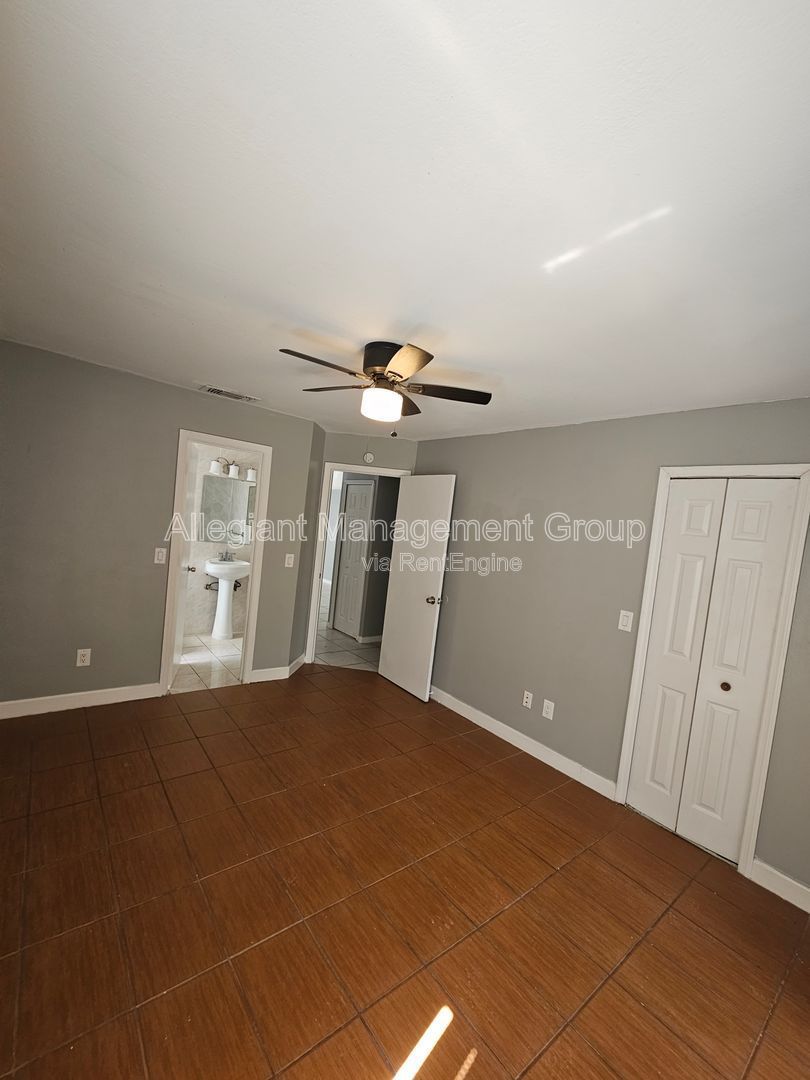 AVAILABLE NOW! 2/2 Single Famly Home W/Converted Garage by Valencia in East Orlando property image
