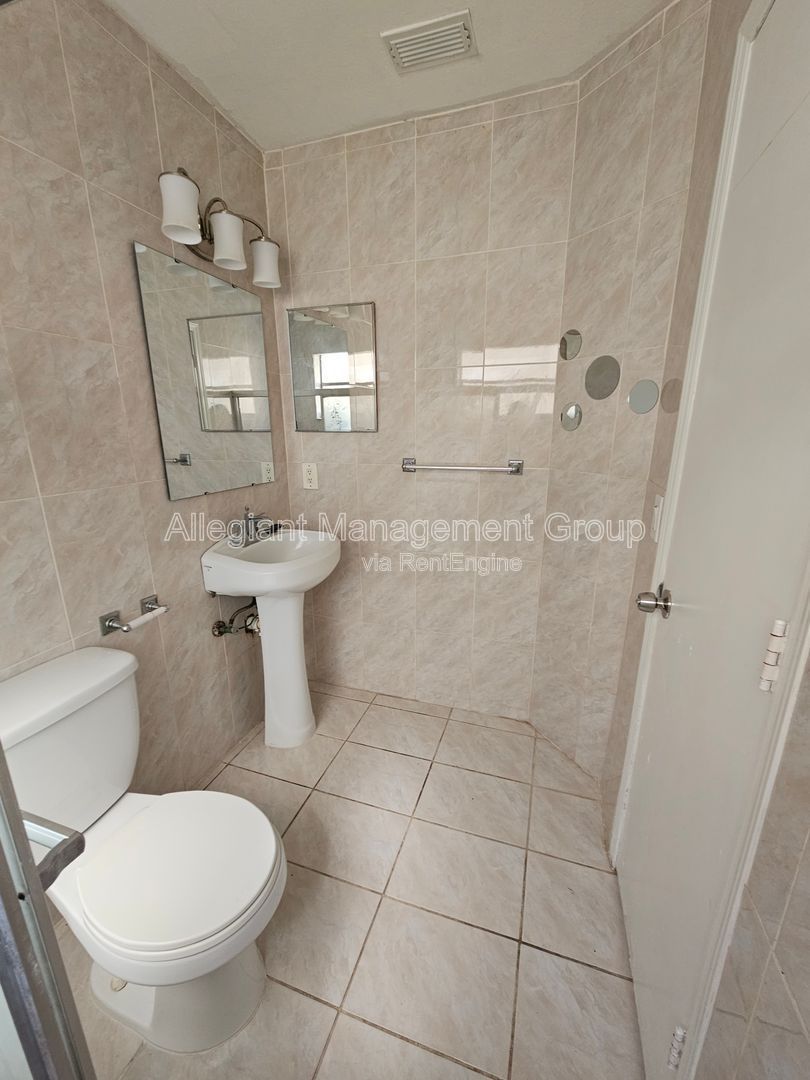 AVAILABLE NOW! 2/2 Single Famly Home W/Converted Garage by Valencia in East Orlando property image