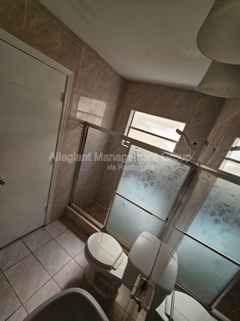 AVAILABLE NOW! 2/2 Single Famly Home W/Converted Garage by Valencia in East Orlando property image