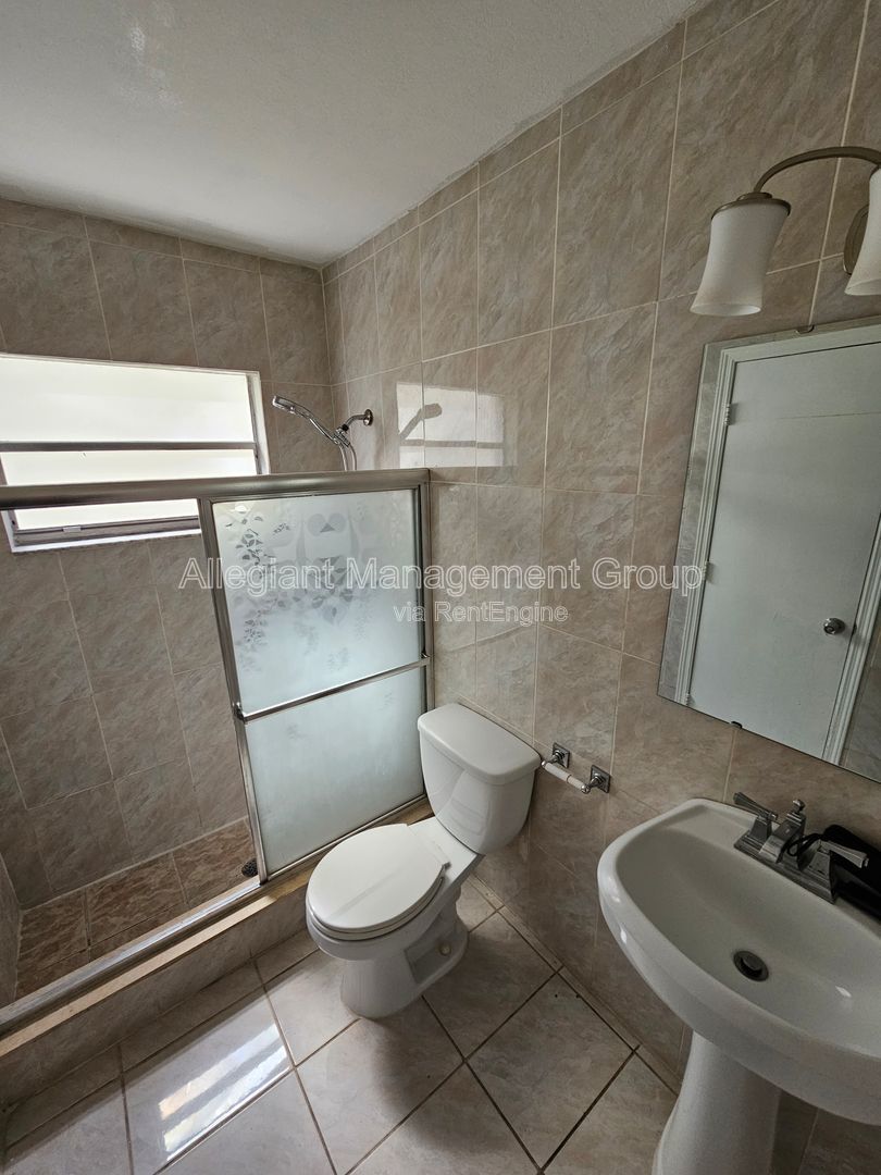 AVAILABLE NOW! 2/2 Single Famly Home W/Converted Garage by Valencia in East Orlando property image