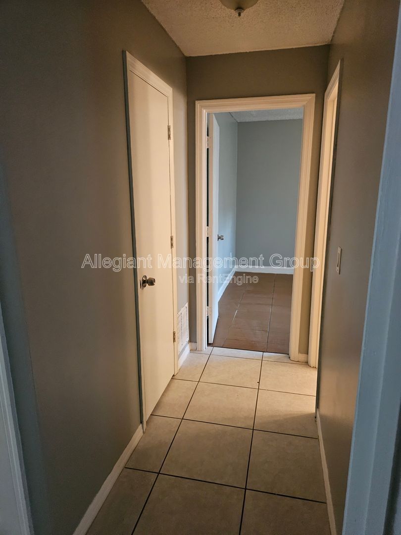 AVAILABLE NOW! 2/2 Single Famly Home W/Converted Garage by Valencia in East Orlando property image