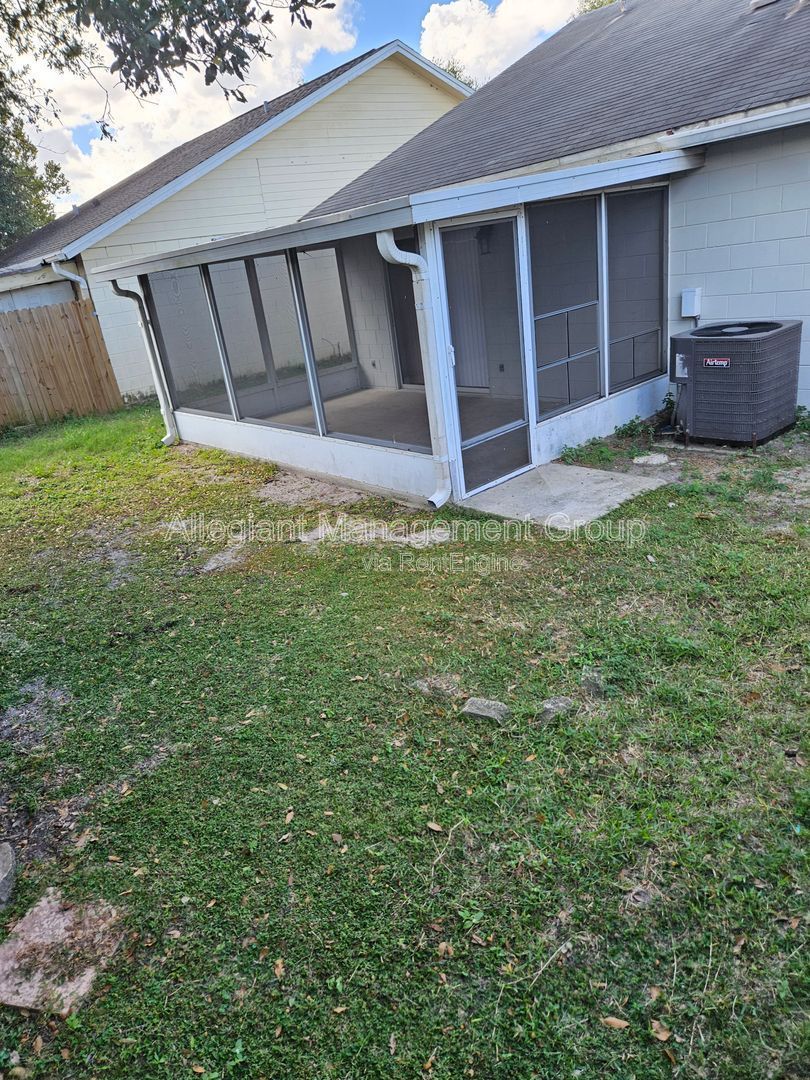 AVAILABLE NOW! 2/2 Single Famly Home W/Converted Garage by Valencia in East Orlando property image