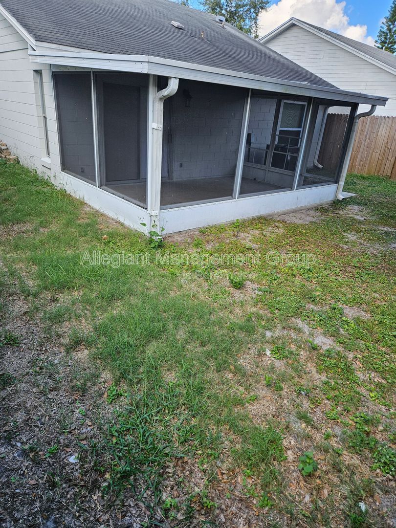 AVAILABLE NOW! 2/2 Single Famly Home W/Converted Garage by Valencia in East Orlando property image