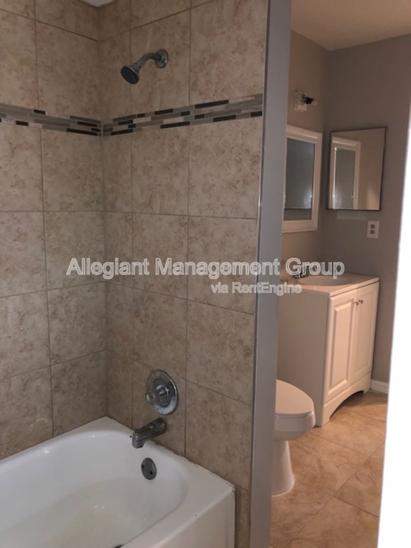 Spacious 3/2 Home In Poinciana With 2 Car garage & Screened Porch For Rent! property image