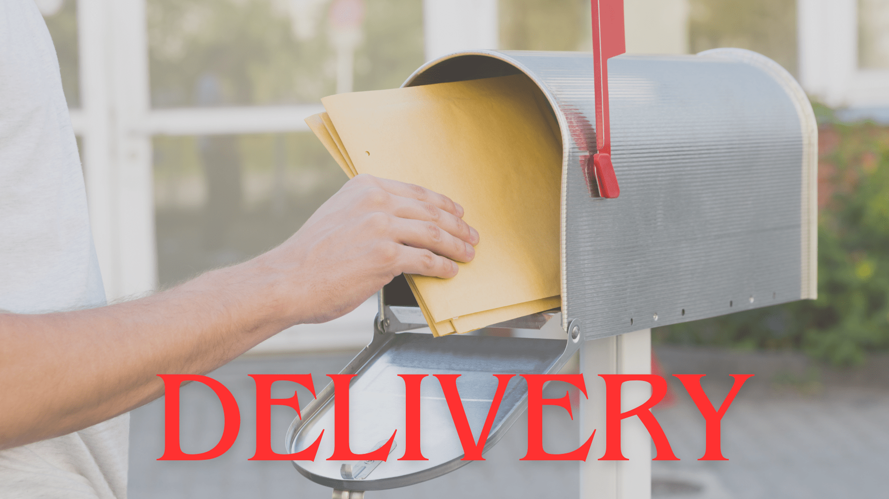 A close-up of a person’s hand placing yellow envelopes into a silver mailbox with a red flag raised. The word 'DELIVERY' is displayed in bold red text, emphasizing the act of mail delivery.